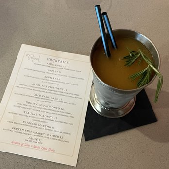 Revel - Frozen Amaretto Cider with Rosemary Sprig - Wine Bars Near Me - Alexandria, Virginia Revel - Frozen Amaretto Cider with Rosemary Sprig - Wine Bars Near Me - Alexandria, Virginia