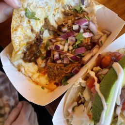 Quesibirria taco on the left