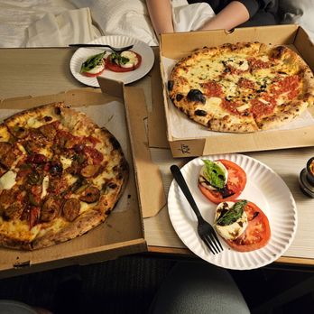 V Pizza - Salsiccia (left), margherita (right), and caprese plate - Pizza Near Me - Orlando, Florida V Pizza - Salsiccia (left), margherita (right), and caprese plate - Pizza Near Me - Orlando, Florida