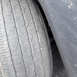 Hertz Rent A Car - More cords exposed on these bald tires, Les Schwab was not going to let this vehicle leave until it had new tires. Hertz sent a tow truck.
