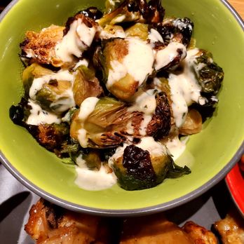 Nando's Peri-Peri - Roasted Brussel sprouts done just right with a Spicy Ranch drizzle. Stick a fork in me, I'm done!!!! - South African Near Me - Chicago, Illinois Nando's Peri-Peri - Roasted Brussel sprouts done just right with a Spicy Ranch drizzle. Stick a fork in me, I'm done!!!! - South African Near Me - Chicago, Illinois