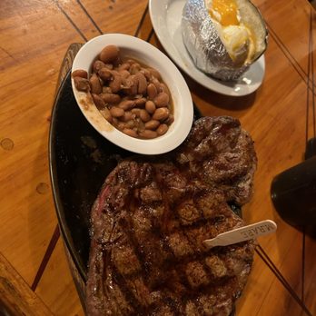 Silver Saddle Steakhouse - 17oz Ribeye w/ Beans and Loaded Potato - Steakhouses Near Me - Tucson, Arizona Silver Saddle Steakhouse - 17oz Ribeye w/ Beans and Loaded Potato - Steakhouses Near Me - Tucson, Arizona