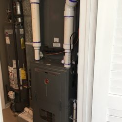 Coastal Air Conditioning - After. 98% efficiency! Very clean and neat in a small area.