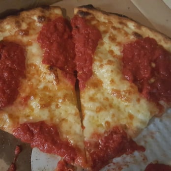 Pizza Rock - Here is our pizza... big red circles of sauce.  No cheese. - Pizza Near Me - Henderson, Nevada