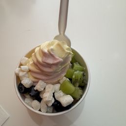 Tropical Mango Strawberry Banana with kiwi, blueberries, mochi, and strawberries. Tropical Mango Strawberry Banana with kiwi, blueberries, mochi, and strawberries.