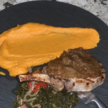Bear Springs Bistro & Lounge - Double prime pork chop with greens and sweet potato mash. - New American Near Me - Highland, California Bear Springs Bistro & Lounge - Double prime pork chop with greens and sweet potato mash. - New American Near Me - Highland, California