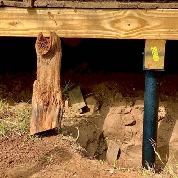 Reyna Foundation Repair  - Out With The Old And in With The New. Old Cedar Post Were Replaced With Our Metal Bracket Piers (MBP) To Offer a Permanent Solution. - Foundation Repair Near Me