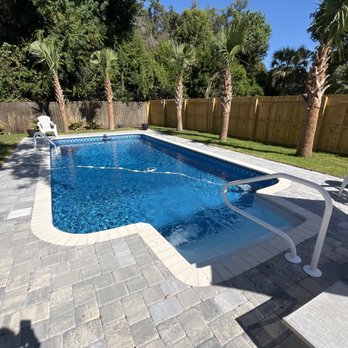 Dolphin Pools - a pool in a backyard setting - General Contractors Near Me - Gulf Breeze, Florida Dolphin Pools - a pool in a backyard setting - General Contractors Near Me - Gulf Breeze, Florida