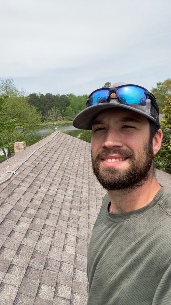 Slide of Wood’s Roofing Solutions