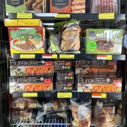 a display of meats and baked goods