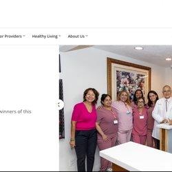 Eric Batres, MD - Dr. Eric Batres with his award as a 2025 Top Performing Chronic Care Practitioner for LA Care.