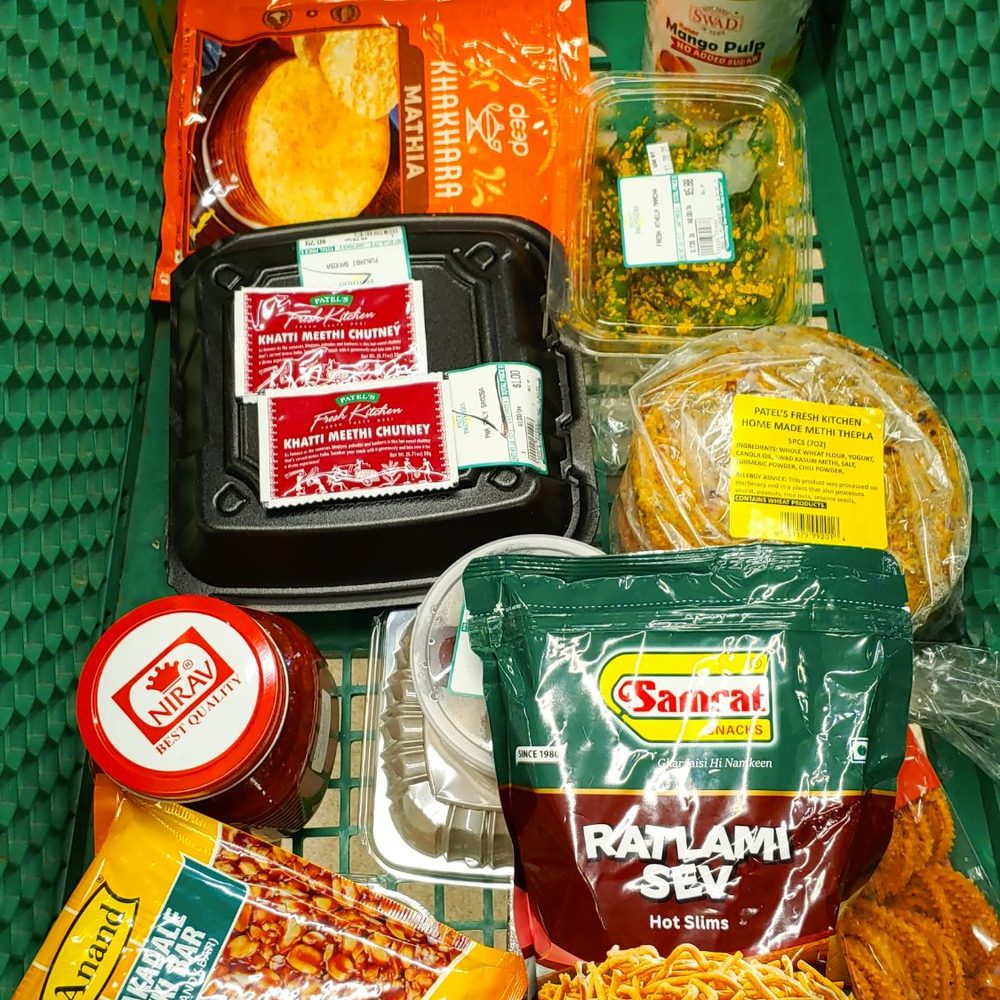 a shopping cart full of food a shopping cart full of food