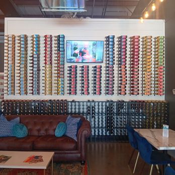 Waters Edge Winery - Wall of wine- nice touch! They also do custom labeling for an inexpensive price! - Wineries Near Me - Moore, Oklahoma