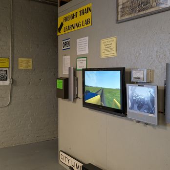 Paducah Railroad Museum - Outside the Simulator Room, and watching the action from the screen on the wall. - Museums Near Me - Paducah, Kentucky Paducah Railroad Museum - Outside the Simulator Room, and watching the action from the screen on the wall. - Museums Near Me - Paducah, Kentucky