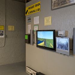 Paducah Railroad Museum - Outside the Simulator Room, and watching the action from the screen on the wall.