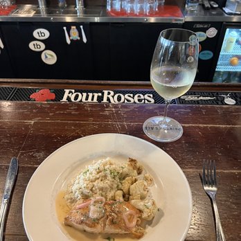 There - a plate of food and a glass of wine - Gastropubs Near Me - Atlanta, Georgia There - a plate of food and a glass of wine - Gastropubs Near Me - Atlanta, Georgia