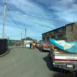 Public Disposal & Recycling Center - The line approaching the register on the left and the dump facility on the right.