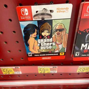 Walmart - The image shows a Nintendo Switch game card for Grand Theft Auto: The Trilogy on a retail shelf, with price tags below. - Department Stores Near Me - Burke, Virginia