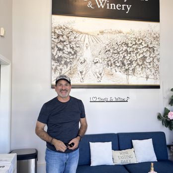 Kula Vineyards & Winery - a man standing in front of a blue couch - Wineries Near Me - Atascadero, California Kula Vineyards & Winery - a man standing in front of a blue couch - Wineries Near Me - Atascadero, California