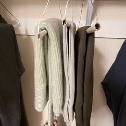 This is how sweaters should hung up on the hangers which this cleaners doesn't seem to understand
