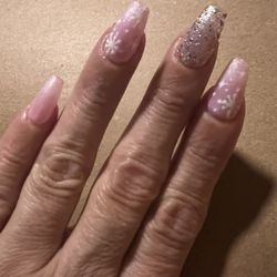 Tina always does an amazing job. I get gel x and they last so long. Whatever design I show her, she can do and even does a better job.