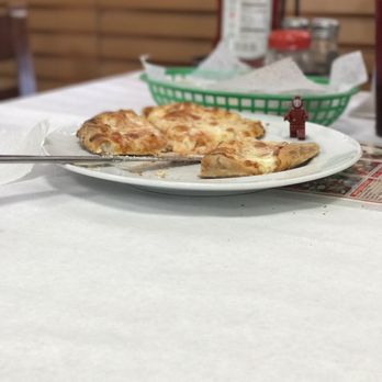 Donna Sarah - Lego man trying the amazing pizza - Pizza Near Me - Cooper City, Florida