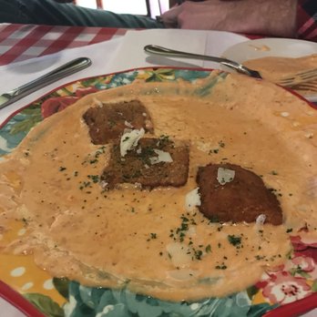Pinocchio's - Toasted Ravioli swimming in the sauce. Tasted good, but it's weird the chef would send a dish out looking like this. - Italian Near Me - Longmont, Colorado
