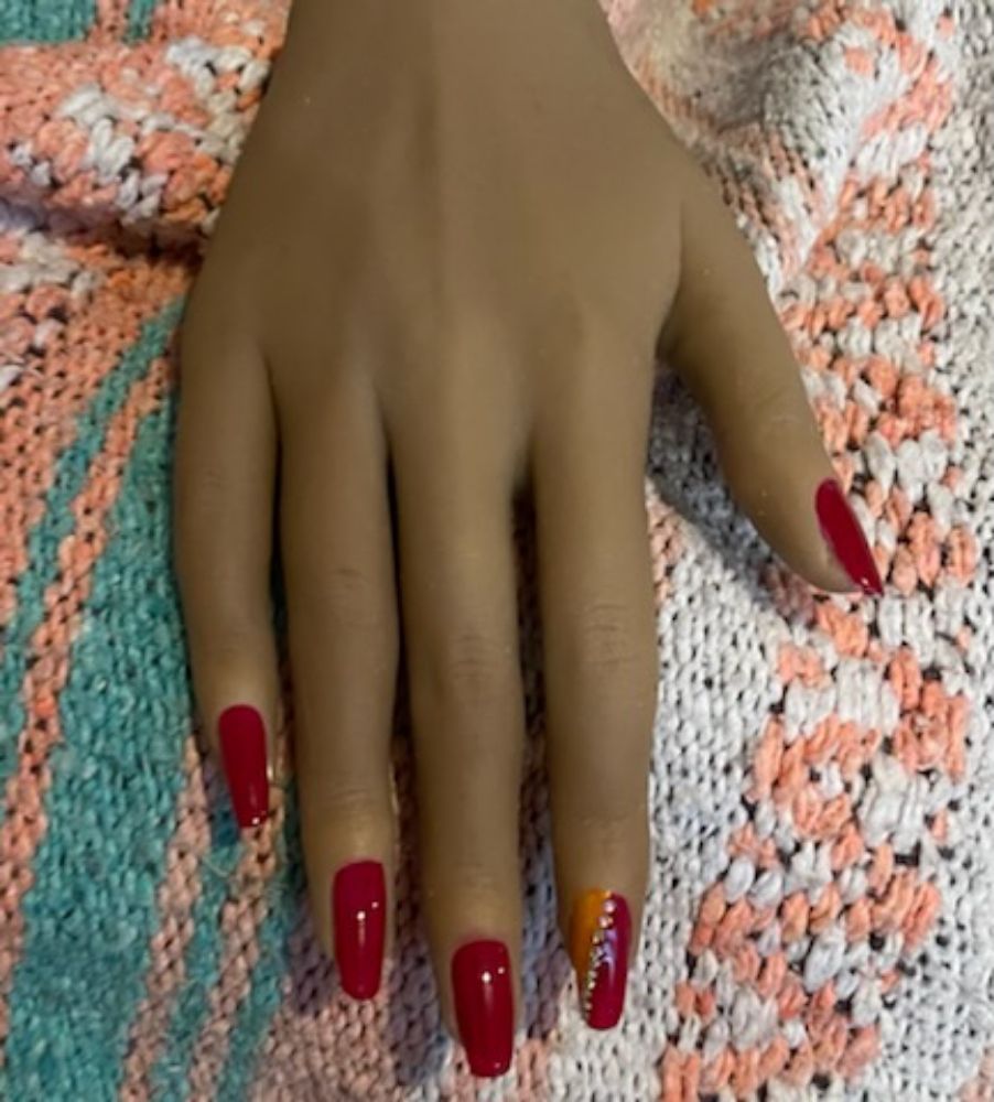 Megan J Nailz Logo