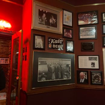Mancini's Char House - a wall full of framed photos - Steakhouses Near Me - Saint Paul, Minnesota