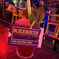 The Electric Cure - Back to 90s Theme - Blockbuster!? I Hardly Knew Her Cocktail (Mezcal, Anxho Reyes Verde, Tajin, Lime, Hibiscus, & cinnamon)