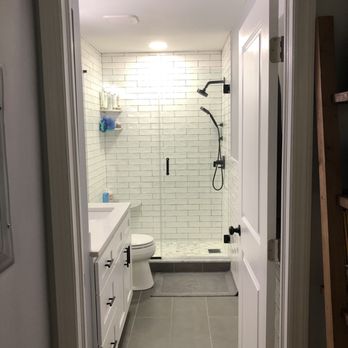 Precise Home Services - Installed heated flooring and custom vanity, replaced ventilation and expanded the space into the hallway by adding 12 sq feet. - General Contractors Near Me