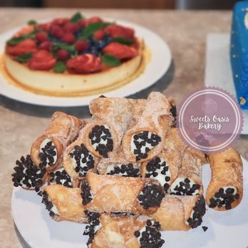 Sweets Oasis Bakery - a plate of pastries and a plate of strawberries - Desserts Near Me Sweets Oasis Bakery - a plate of pastries and a plate of strawberries - Desserts Near Me