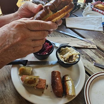 Cafe International - Sausage platter: you can pick 1, 2 or 3 sausages of different flavors - American Near Me - Helen, Georgia Cafe International - Sausage platter: you can pick 1, 2 or 3 sausages of different flavors - American Near Me - Helen, Georgia