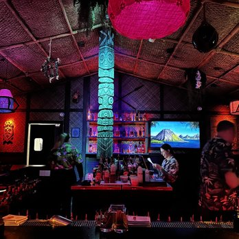 Wahi Hana - Behind the bar. Note the candid smile from the staff. - Tiki Bars Near Me - Vancouver, Washington