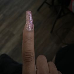 Top Bar Nails & Spa - My nail is crooked. I told the lady and she said I know and did not care at all.... But I paid $50 for this crap.