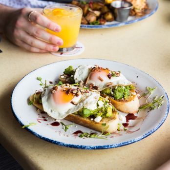 Jack Allen's Kitchen - Avocado Toast at Brunch: Toasted sourdough bread, fresh smashed avocado, feta cheese, toasted pecans, balsamic reduction, sunny-side-up eggs - Southern Near Me - Austin, Texas Jack Allen's Kitchen - Avocado Toast at Brunch: Toasted sourdough bread, fresh smashed avocado, feta cheese, toasted pecans, balsamic reduction, sunny-side-up eggs - Southern Near Me - Austin, Texas