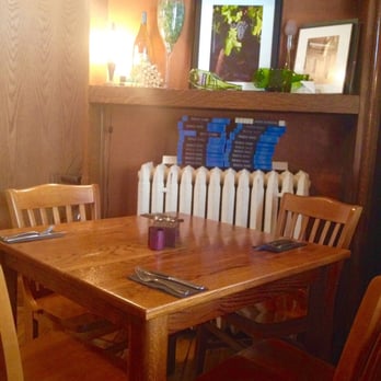 Woody's Library Restaurant - The main dining area. Lots of warm-colored wood and soft lighting. - New American Near Me - Carmel, Indiana Woody's Library Restaurant - The main dining area. Lots of warm-colored wood and soft lighting. - New American Near Me - Carmel, Indiana
