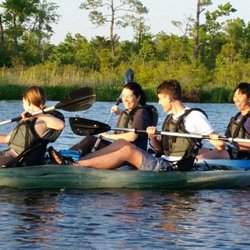 Adventure Kayak & SUP Tours - Sunset paddle on West Neck Creek in Virginia Beach.