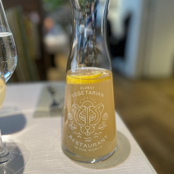 Hiltl - White tea, lemon balm & cardamom tea - Vegetarian Near Me - Zürich, ZH Hiltl - White tea, lemon balm & cardamom tea - Vegetarian Near Me - Zürich, ZH