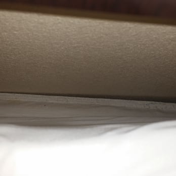 Wyndham Garden Midland - Yes this is the back side of the bed. Public hair, dust, bugs, crumbs... pretty sure it has never been washed!! - Hotels Near Me - Midland, Texas Wyndham Garden Midland - Yes this is the back side of the bed. Public hair, dust, bugs, crumbs... pretty sure it has never been washed!! - Hotels Near Me - Midland, Texas