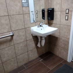 Murphy USA - No interior lock on the women's restroom door, and it's too far too hold it closed while you are on the toilet.