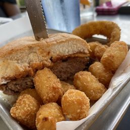50/50 Burger with tots was over the top and what a great piece of meat.  Served in a very nice setting