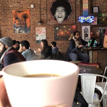 PLG Coffee House and Tavern - Coffee and decorated wall inside - Coffee & Tea Near Me - Brooklyn, New York PLG Coffee House and Tavern - Coffee and decorated wall inside - Coffee & Tea Near Me - Brooklyn, New York