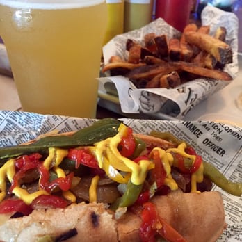 Link N Hops - Smoked Andouille with sautéed onions, sweet peppers and grilled jalapeños. Paired with Belgium fries and a nice cold brew - Beer Bar Near Me - Los Angeles, California