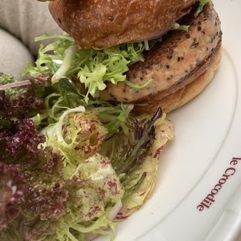 Le Crocodile - Salmon Burger with potatoes roll and petite salad - French Near Me - Brooklyn, New York Le Crocodile - Salmon Burger with potatoes roll and petite salad - French Near Me - Brooklyn, New York