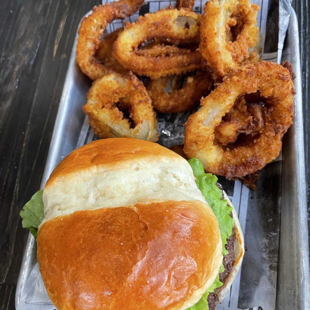 Fourths IV - Mushroom burger with onion rings - Burgers Near Me - Austin, Texas Fourths IV - Mushroom burger with onion rings - Burgers Near Me - Austin, Texas