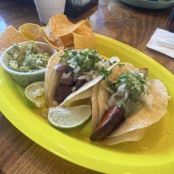 Yummy Tacos - Two Taco Deluxe (steak + chorizo) chips + guac - Tacos Near Me - Williston Park, New York Yummy Tacos - Two Taco Deluxe (steak + chorizo) chips + guac - Tacos Near Me - Williston Park, New York