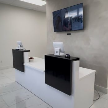 Belette's Custom Cabinets - The reception desk - Cabinetry Near Me - Florida City, Florida Belette's Custom Cabinets - The reception desk - Cabinetry Near Me - Florida City, Florida