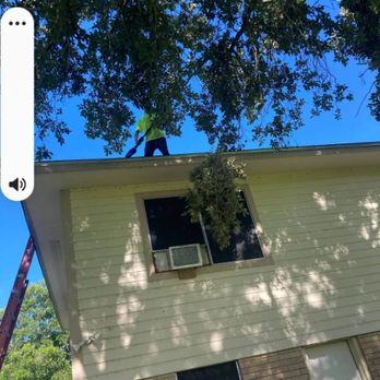 Davis Tree Care And More - Me trimming a oak tree away from a house - Tree Services Near Me - San Leon, Texas Davis Tree Care And More - Me trimming a oak tree away from a house - Tree Services Near Me - San Leon, Texas