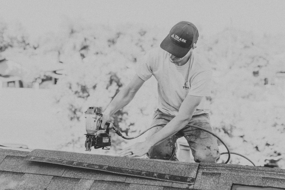 Slide of Triark Roofing